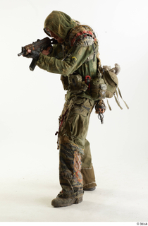 Photos John Hopkins Army Postapocalyptic Suit Poses aiming the gun…